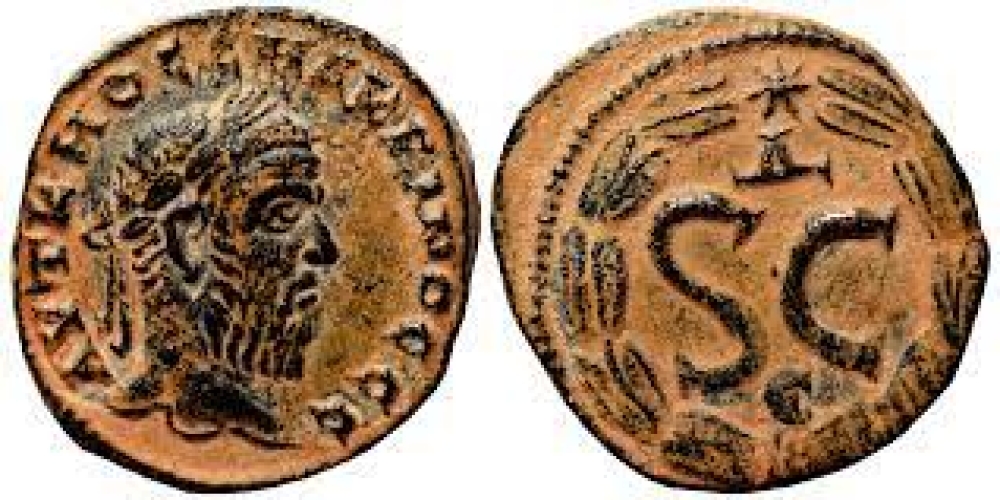 MACRINUS AE19. EF. Antioch mint. Wreath – SC.